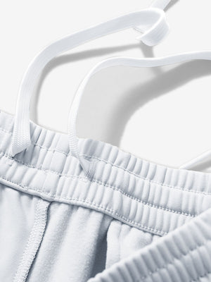 Close-up of the waistband with drawstring detail of misty grey fleece stretch water resistant boys joggers.