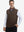 Model with hands in pockets, wearing print collar quarter zip golf vest in coffee brown, casual look.