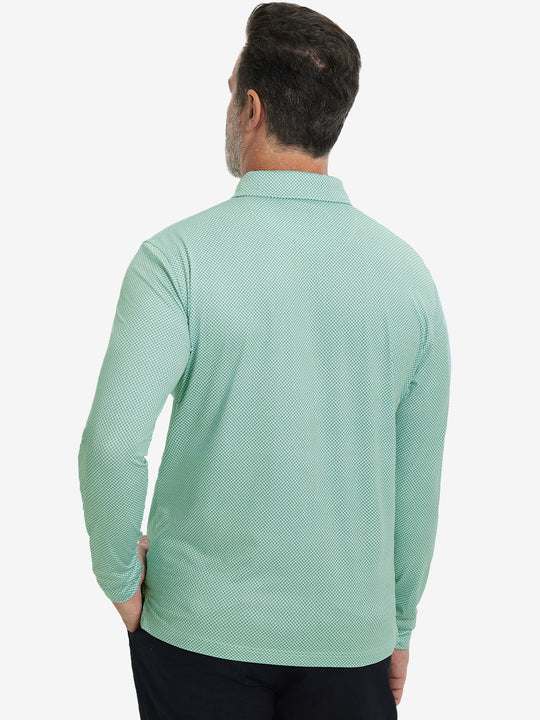 Back upper body view of the lightweight print polo in green plant, model turns slightly with relaxed pose.