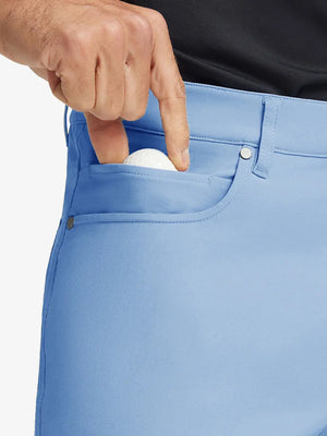 LIGHT BLUE 4-way Stretch Performance Solid Shorts, front pocket holding golf ball detail, 7 Inch