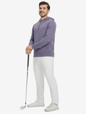 Model full-body view holding a golf club wearing warm fleece golf hoodies pullover in purple.