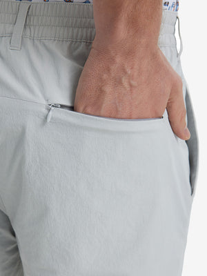 Back view of Performance Water Resistant Pants in SILVER GREY，model’s hand casually in back pocket.