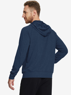 Back angle of the Cobalt Heather Quarter Zip Hoodie, model turns head slightly for a relaxed look.