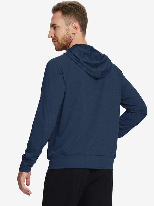 Back angle of the Cobalt Heather Quarter Zip Hoodie, model turns head slightly for a relaxed look.