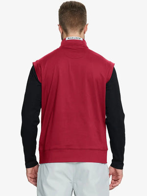 Back half-body view of model in RED Stretch Solid Fleece Quarter-Zip Vest.								

