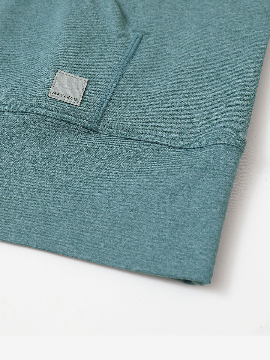 Hemline detail of the Quarter Zip Hoodie in Aqua Heather, showing neat edges and fine craftsmanship.