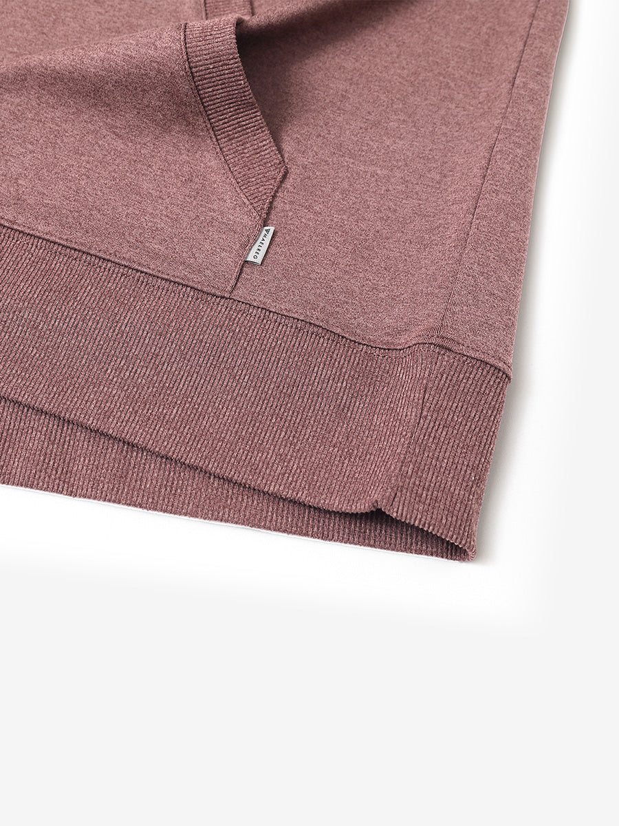 Hem detail of the Pink Heather Athletic Golf Hoodie, highlighting clean stitching and neat design.