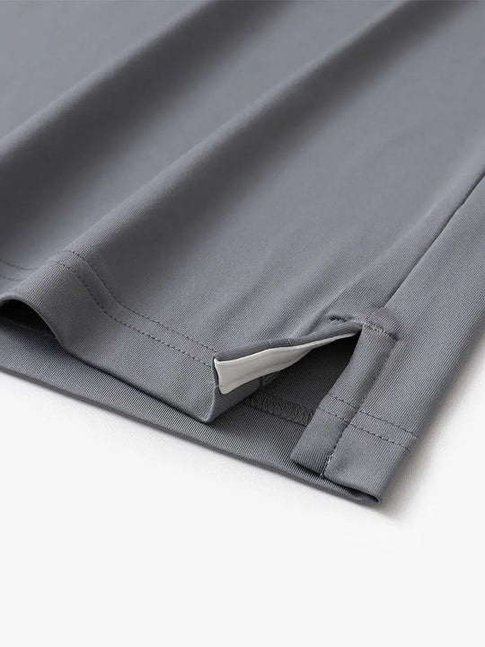 Close-up of side slit detail on LIGHT GREY Chest Print Polo Shirts