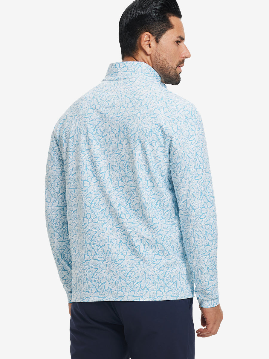 Back upper body angle of the blue artichoke full print quarter zip pullover, model turns head slightly.