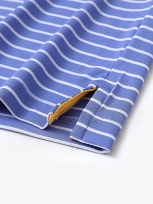 Hem slit detail of BLUISH BLUE/WHITE STRIPE Youth Performance Golf Polo highlighting stitching and finish.