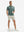 Full-body shot of model in green leaf breathable jacquard pattern 3-button golf polo