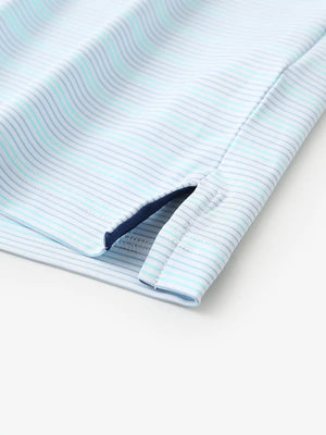 Close-up of side hem slit on Slate Blue Aqua Blue Stripe Performance Stripe Golf Shirt