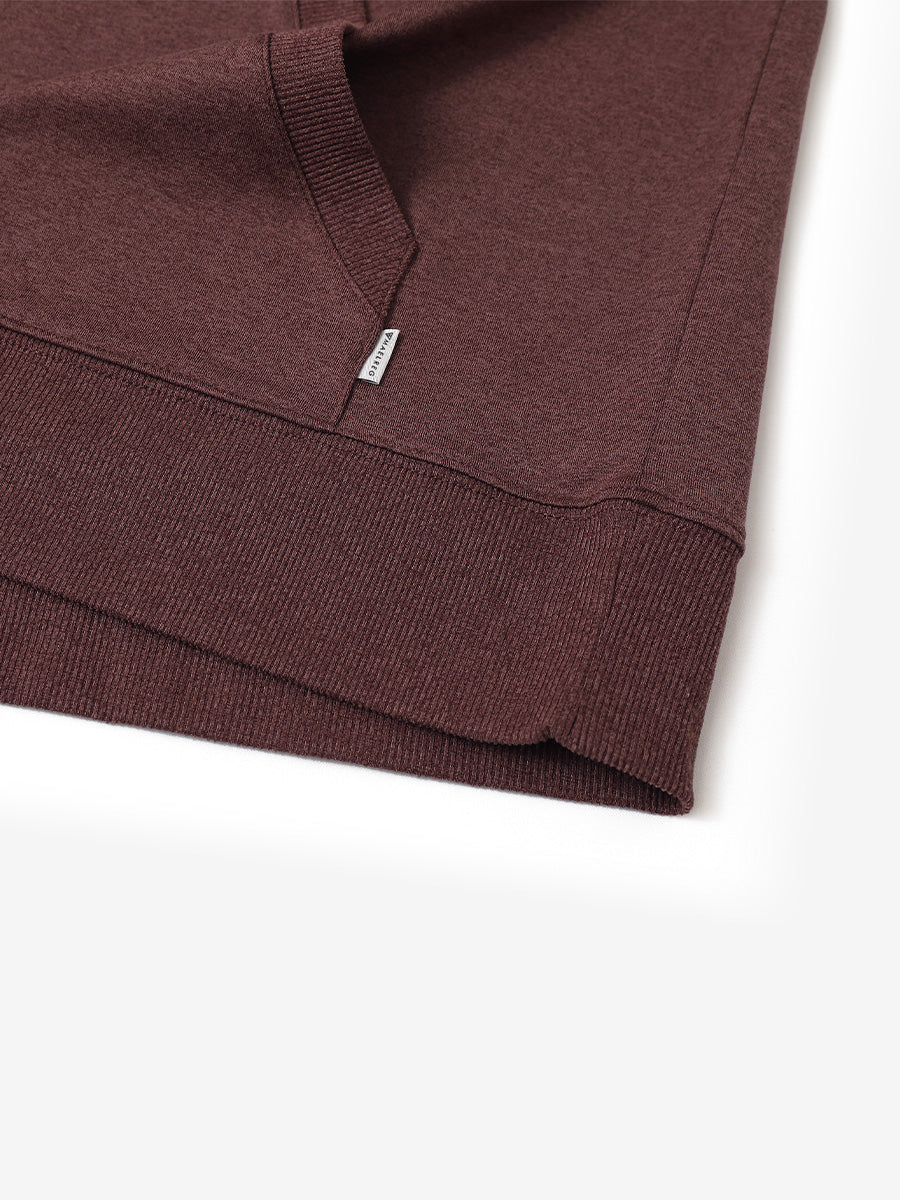 Hem detail of the Brick Heather Athletic Golf Hoodie, highlighting clean stitching and neat design.