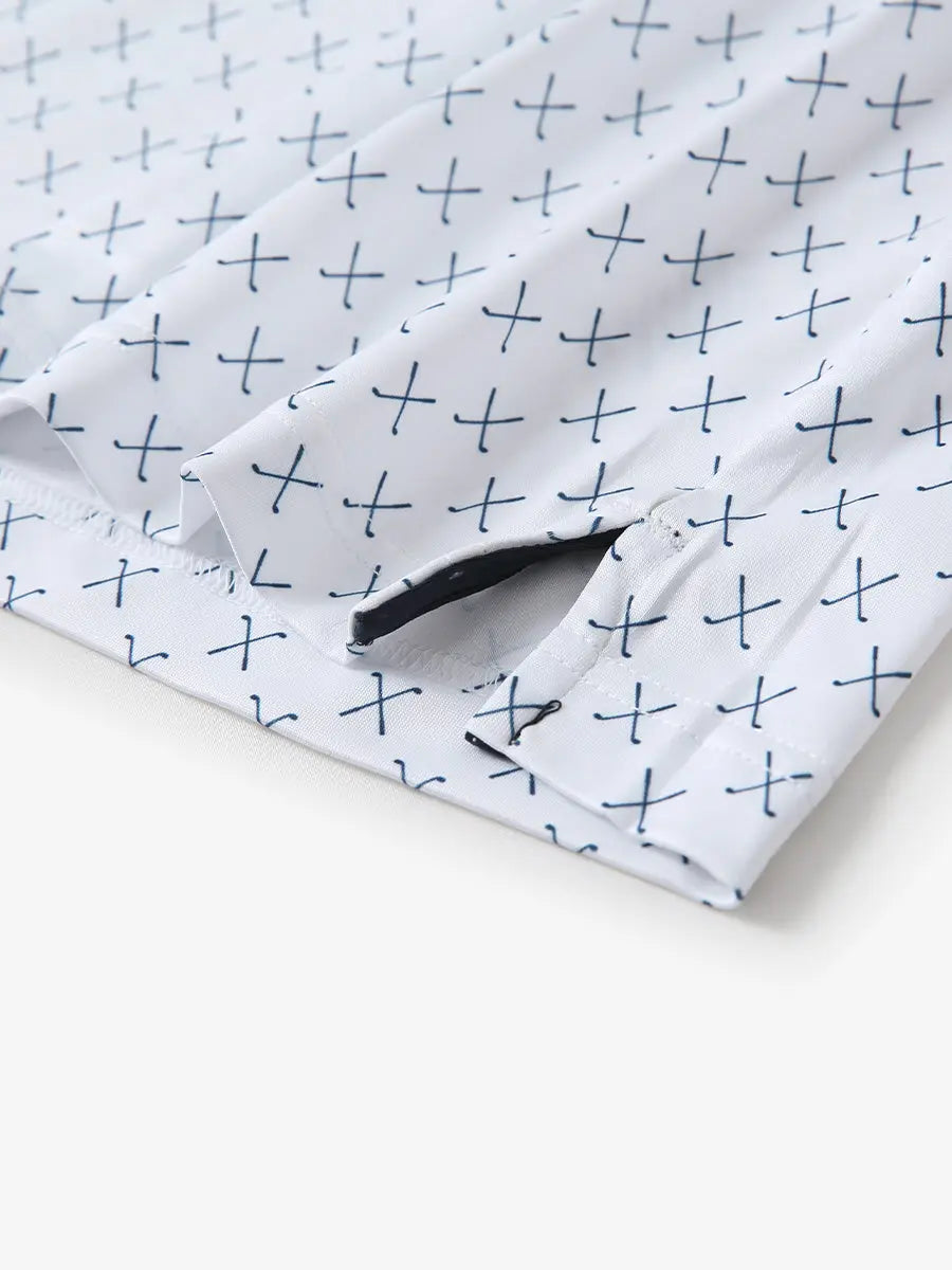 Hem slit detail of WHITE NAV CLUE Performance Quick Dry Print Golf Polo highlighting stitching and finish
