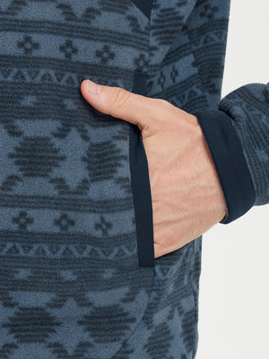 Hand in pocket detail of the Navy Ethnic Quarter Zip Polar Fleece Sweatshirt, soft fleece fabric.