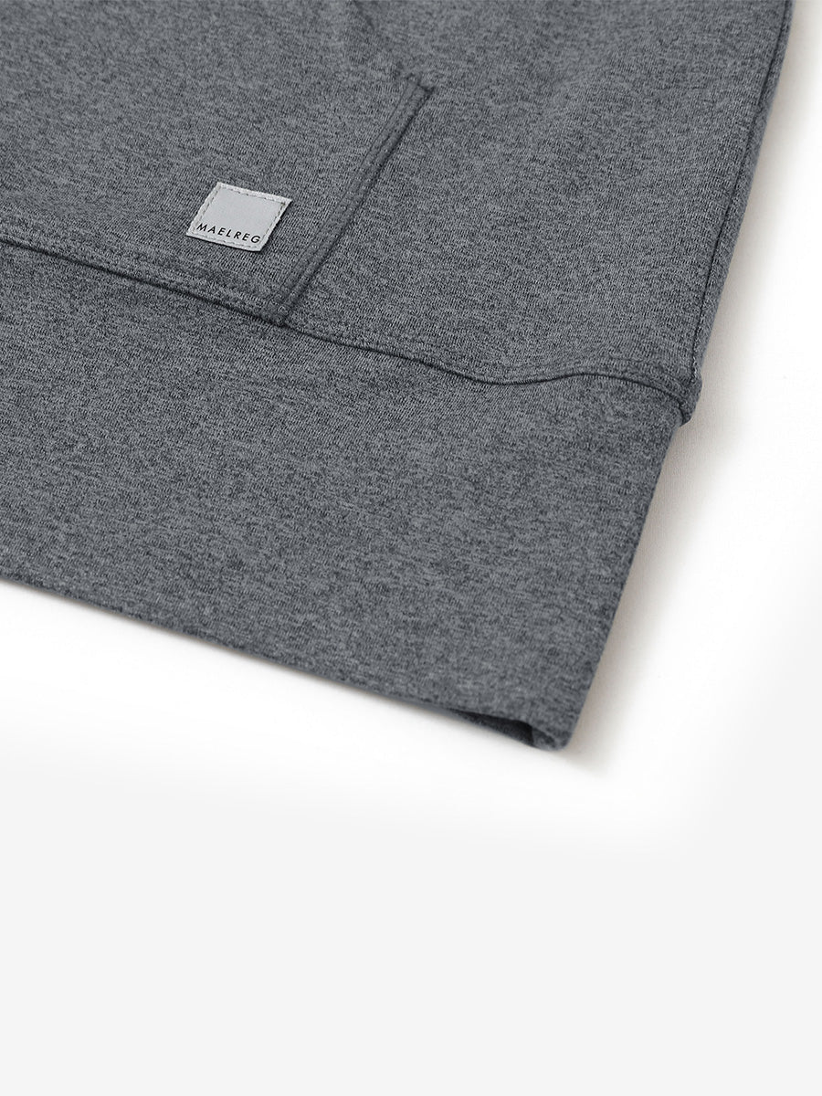 Hemline detail of the Quarter Zip Hoodie in Black Grey Heather, showing neat edges and fine craftsmanship.