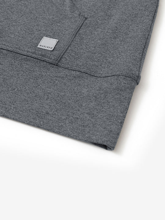 Hemline detail of the Quarter Zip Hoodie in Black Grey Heather, showing neat edges and fine craftsmanship.