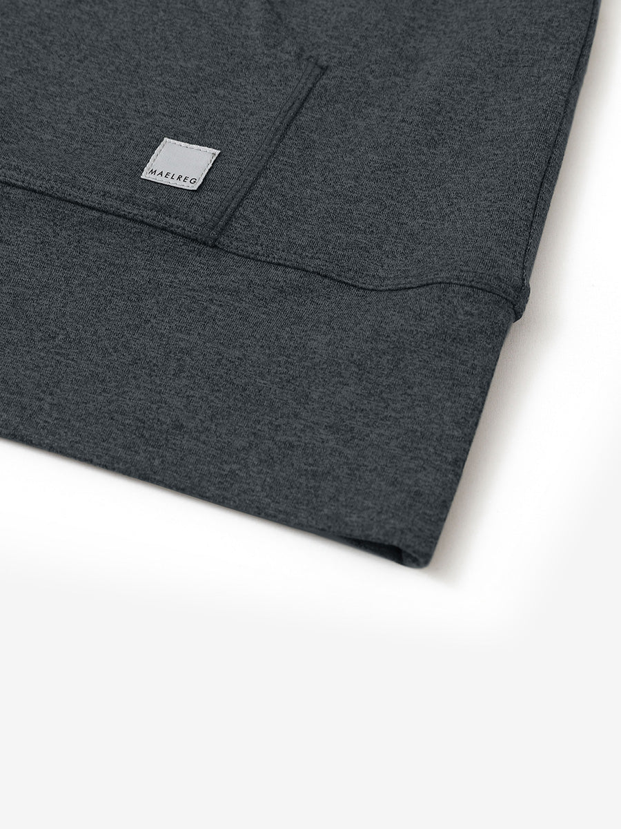 Hemline detail of the Quarter Zip Hoodie in Dark Grey Heather, showing neat edges and fine craftsmanship.