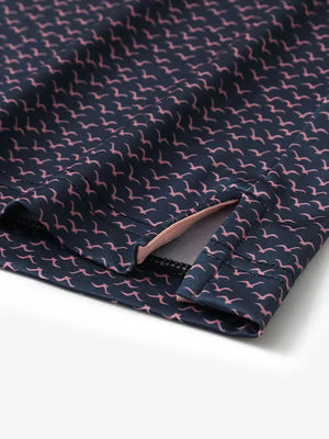 Hem slit detail of MAELREG Performance Jersey Print Polo in Navy Pink Seagull – comfort & movement