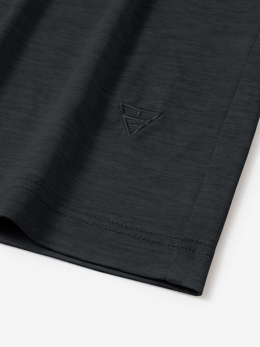 Hem detail of Men’s Long Sleeve Mock Turtleneck Shirt in Black, showcasing smooth finish.