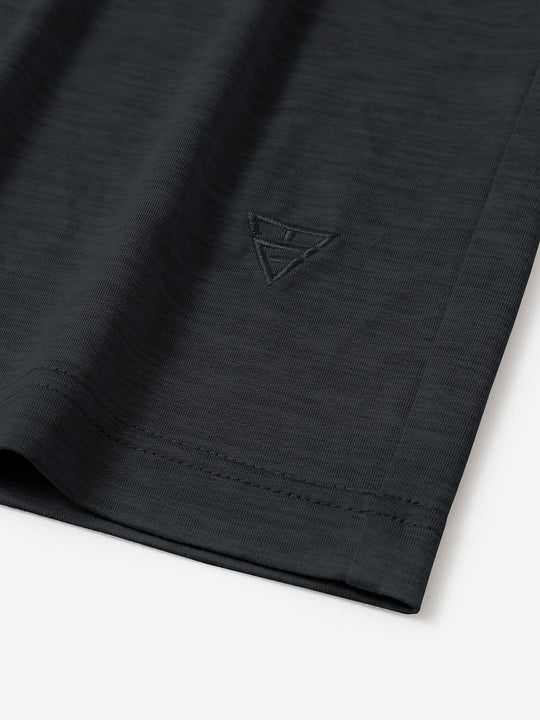 Hem detail of Men’s Long Sleeve Mock Turtleneck Shirt in Black, showcasing smooth finish.