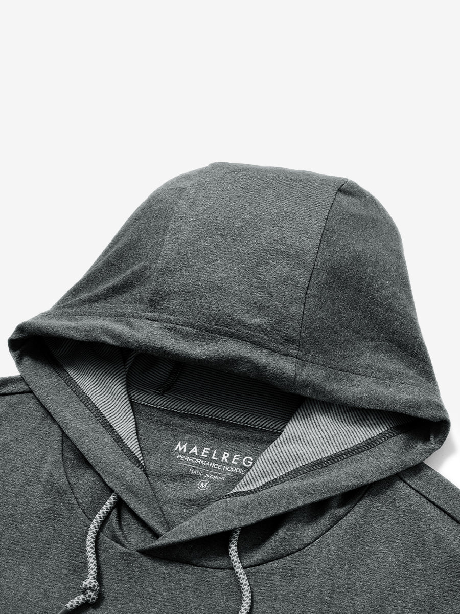 Hood detail of the classic heather pullover hoodie in black melange, showcasing fabric and stitching.