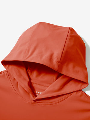 Hood detail of the orange dry fit stretchy sweatshirts hoodie, showing smooth fabric and neat seams.