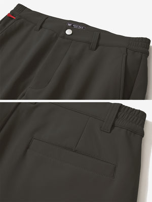 Close-up of the waistband details on coffee water-resistant stretch heat-tech winter trousers