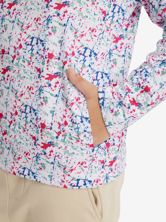 Model with both hands in pockets wearing youth full print stylish hoodies pullover in white painting.