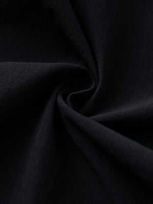Fabric close-up of Performance water resistant pants with durable texture and black detail