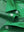 Detail: collar opening of green stripe upgraded two-tone striped quick dry polo shirt