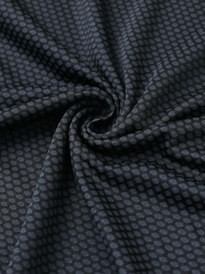 Close-up of dark grey/black your favorite jacquard polo fabric showing textured knit and soft finish.