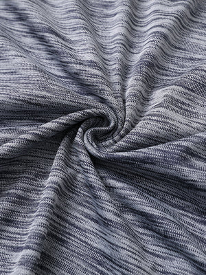 Close-up of navy heather texture polo fabric showing soft surface.