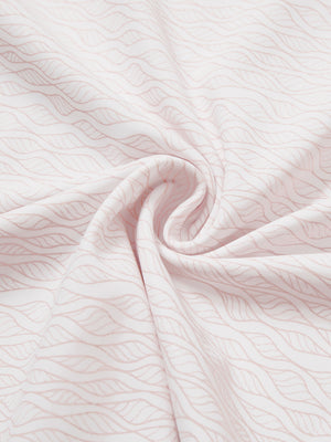 Close-up of orange line full print lightweight quarter zip pullover fabric, soft and breathable texture