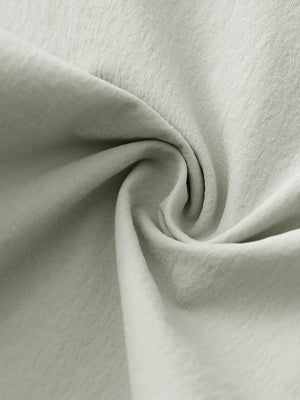 Fabric close-up of Performance water resistant pants with durable texture and light khaki detail