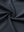 Fabric close-up of dark grey cotton blend pique plain shirt, breathable pique fabric texture.