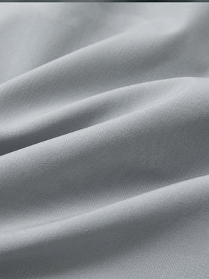 Close-up fabric texture detail of light gray water-resistant short sleeve q-zip hoodie for boys