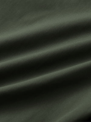 Fabric close-up of Water resistant everyday pants with durable surface in olive green