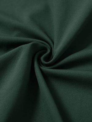 Fabric detail of youth long sleeve hoodied with kangaroo pocket, soft knit texture with forest green tone