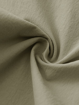 Fabric close-up of Performance water resistant pants with durable texture and khaki detail