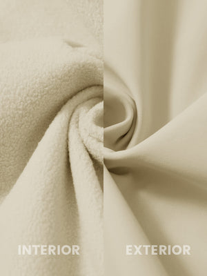 Close-up of the inner and outer fabric of winter thermal outdoor water resistant fleece jacket in light khaki, showing fleece lining and exterior.