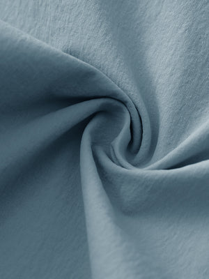 Fabric close-up of Performance water resistant pants with durable texture and powder blue detail
