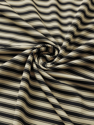 Close-up of black khaki yarn dyed stripe polo fabric showing distinct woven stripes and textured surface.