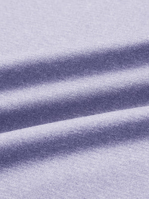 Close-up of classic heather pullover hoodies with 2 pocket fabric in light purple melange, soft knit texture