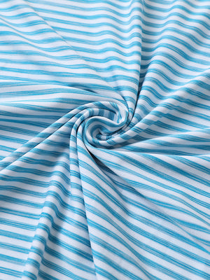 Close-up of bluebird white unique watercolour stripe polo fabric showing soft, blended stripes and smooth texture.