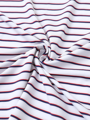 Close-up of white/navy stripe popular yarn dyed stripe polo fabric showing crisp lines and soft texture.