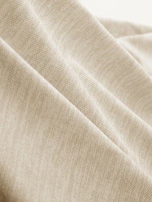 Fabric close-up of Premium Stretch Heather Polo showing crisp stripes and light khaki heather detail