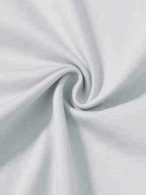 Close-up texture of  light grey heather warm puffer winter golf jacket fabric showing detailed premium material and weave