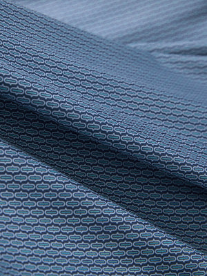 Fabric close-up of Performance quick dry print golf polos showing breathable texture in navy light blue ovals
