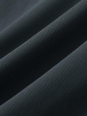 Close-up of soft mesh fabric for dark grey superion softness mesh joggers with zipper pockets